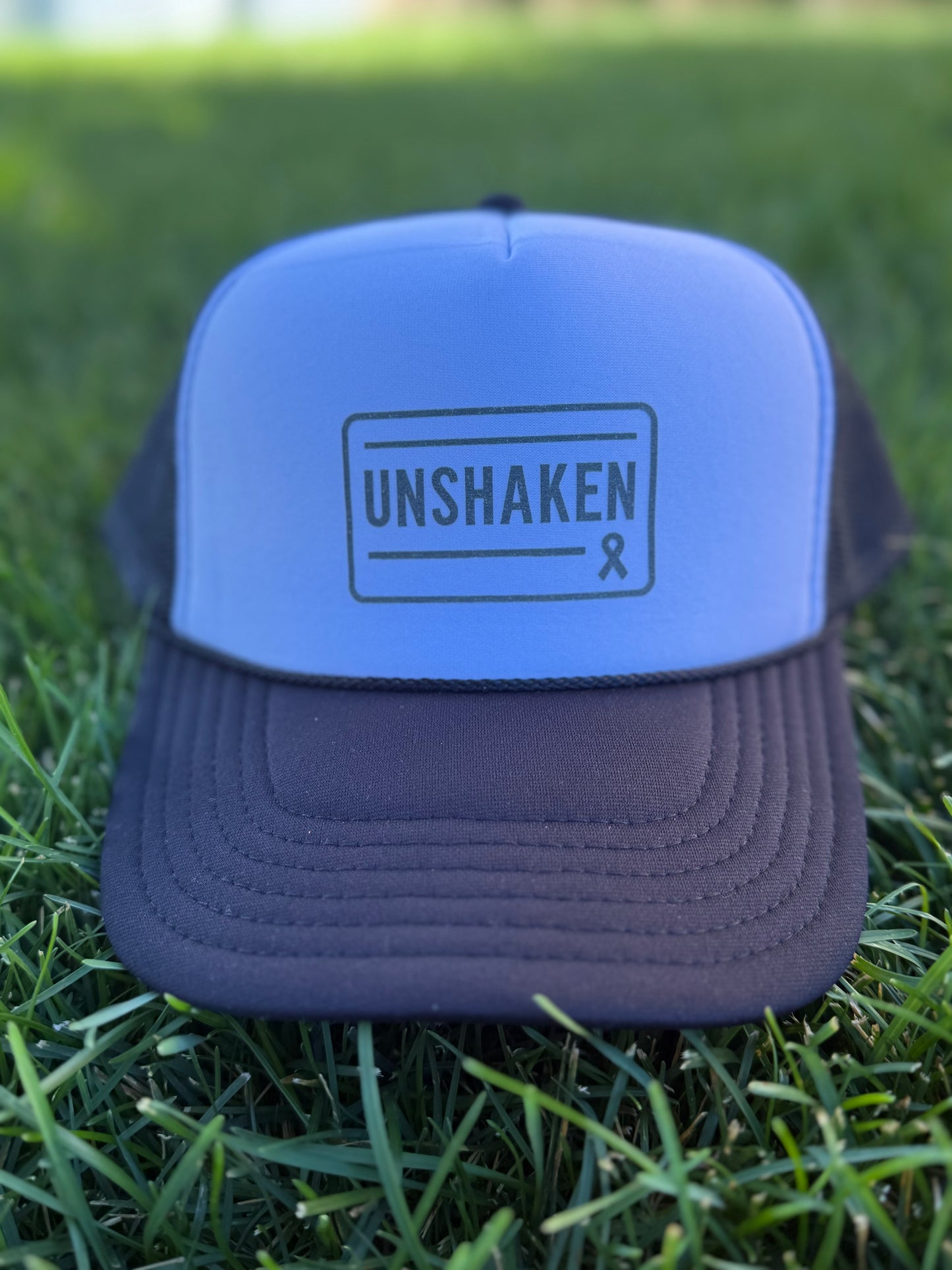 Unshaken Trucker Hat
